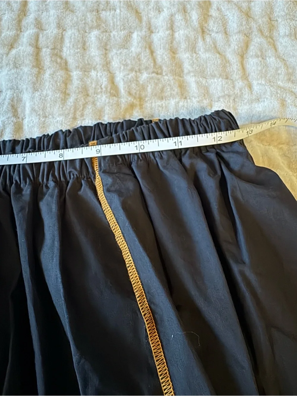 BASERANGE The Turn Skirt In Black Organic Cotton Contrast Stitch Twisted Seams